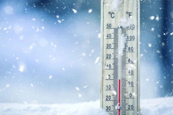 Temperature conversion chart showing 23 degrees Celsius equaling 73.4 degrees Fahrenheit with a thermometer illustration.